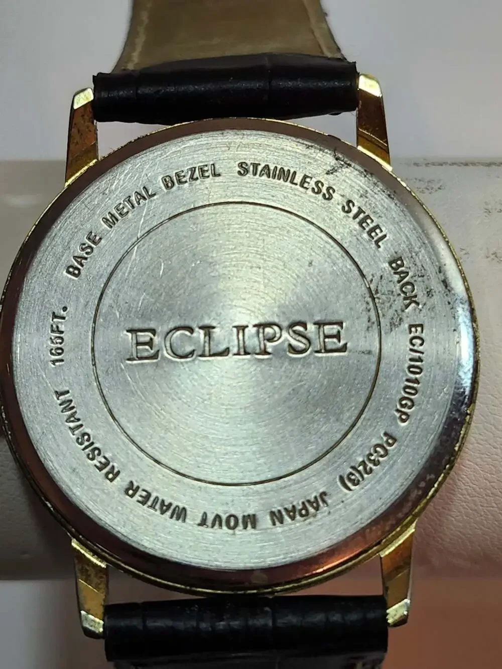 Eclipse Men's Gold Tone Quartz Watch with Black Leather Strap and Date Indicator